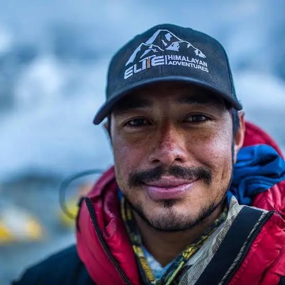 Portrait of Nirmal Purja in a climbing cap
